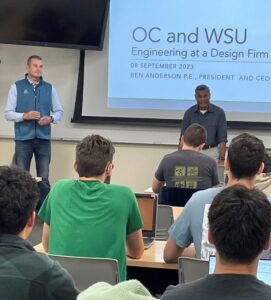 Ben presenting in front of college students